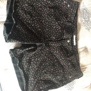 Cute Levi’s shorts, black with rosebud pattern.